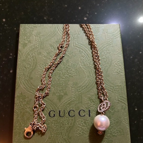 Gucci Jewelry - Gucci Gold Plated Necklace with Pearl and Crystal GG Logo Accent. EUC